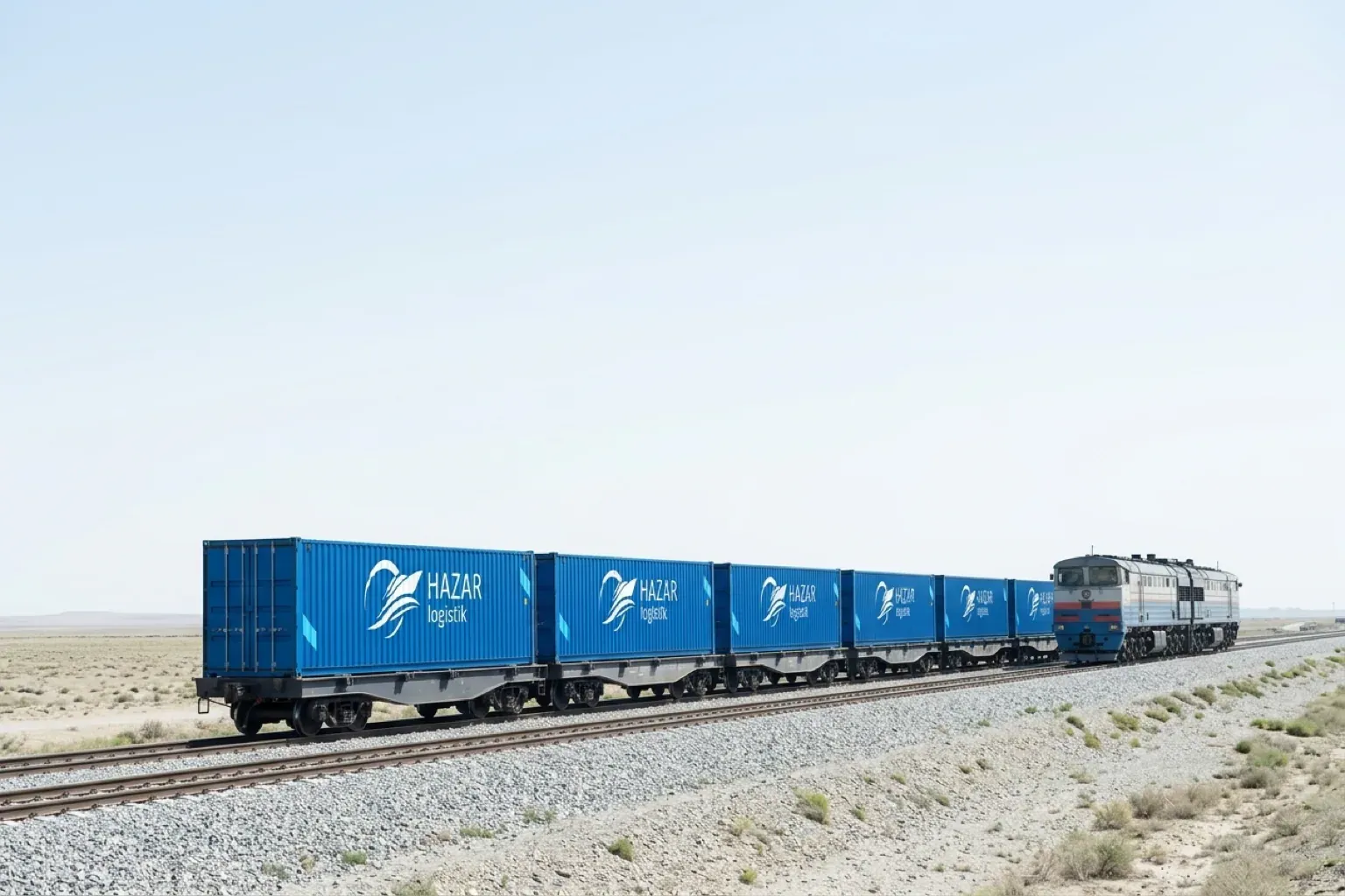 A freight train of Hazar Logistik containers crossing the steppe
